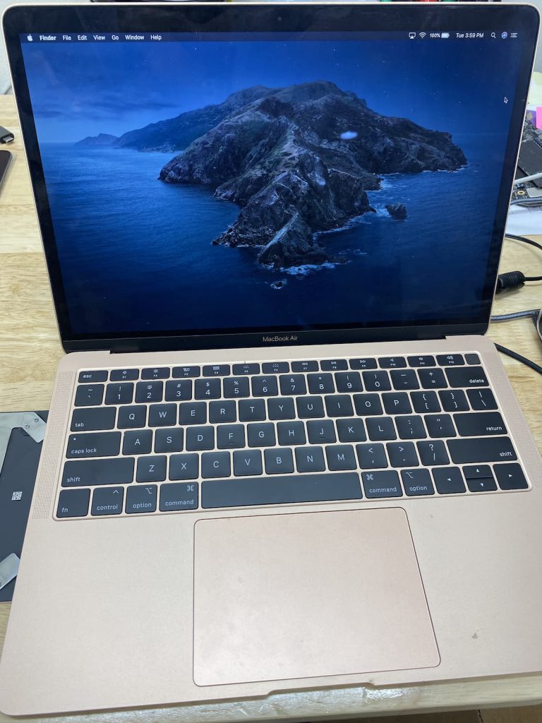 MacBook Air was repaired and working after the trackpad replacement.