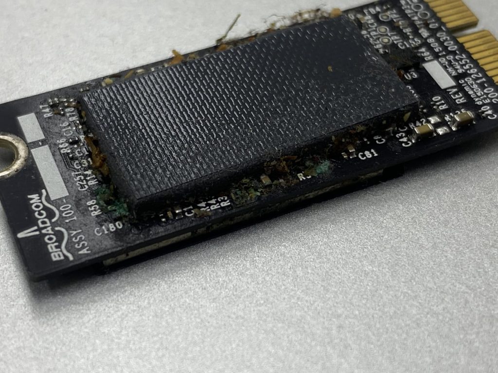 Closeup of liquid damaged Wifi card.