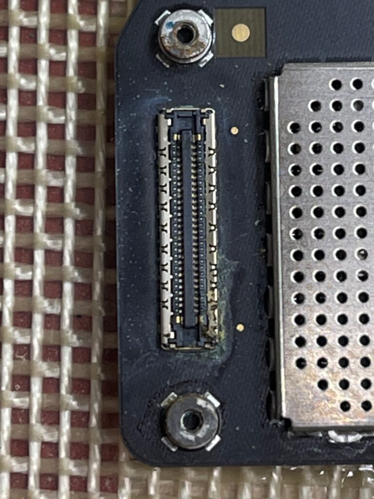 Connector on 2020 Macbook Air liquid damaged logic board.