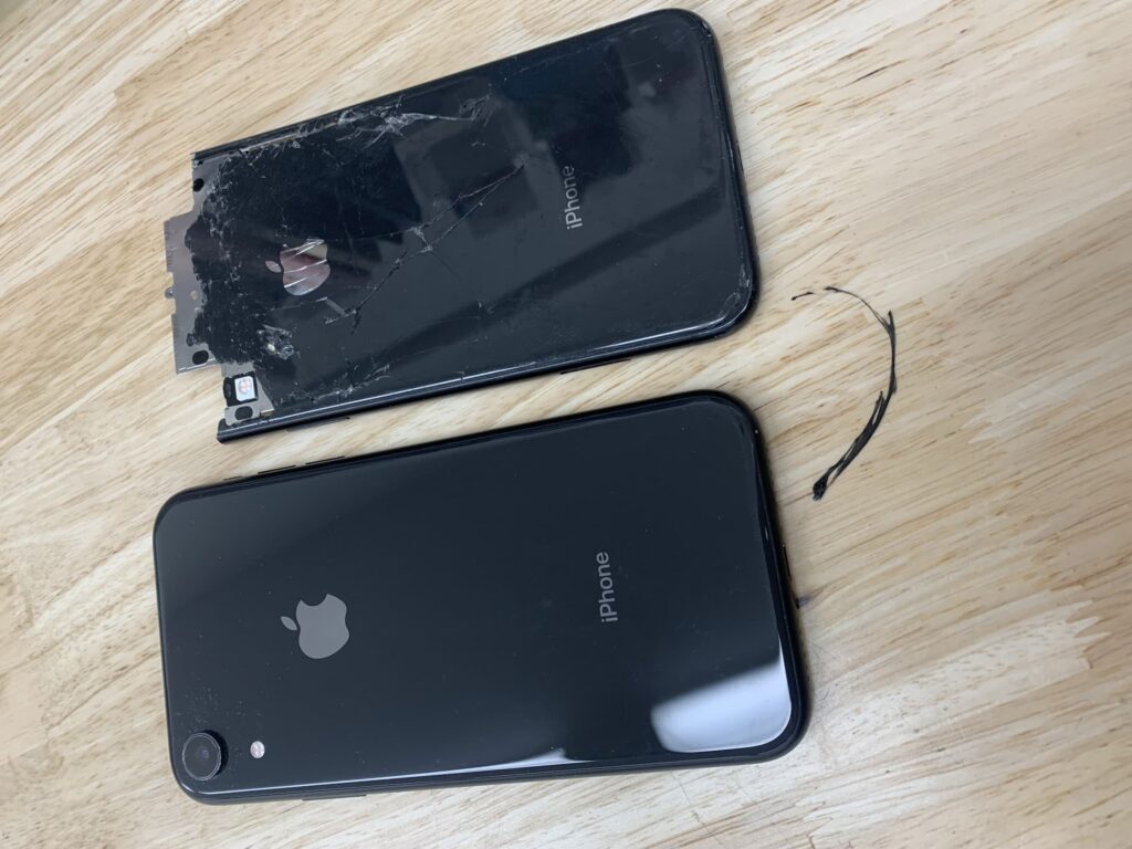 Side by side iPhone XR Repaired next to broken back